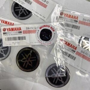 EMBLEMA TAPA TANQUE SZR/SZRR